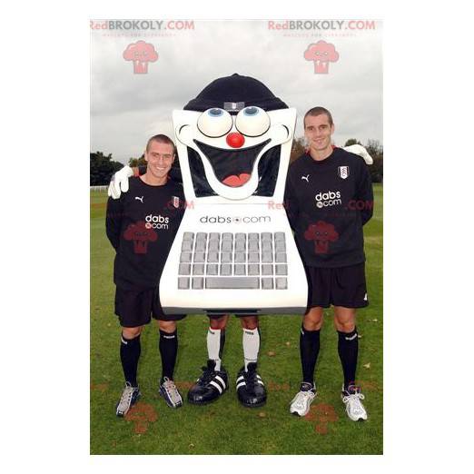 Mascotte d'ordinateur noir et blanc avec son clavier -