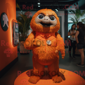 Maskotfigur af en orange...
