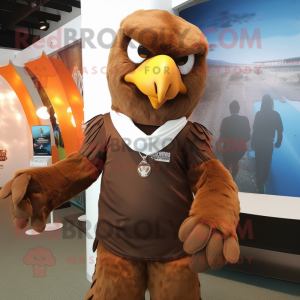 Brown Eagle mascot costume character dressed with a Poplin Shirt and Wraps