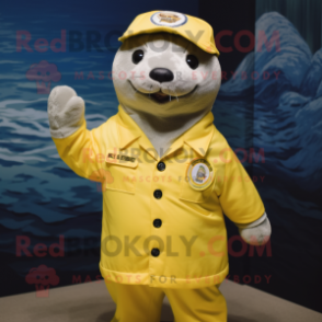 Yellow Seal mascot costume character dressed with a Button-Up Shirt and Caps