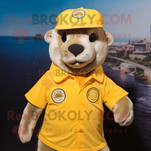 Yellow Seal mascot costume character dressed with a Button-Up Shirt and Caps