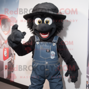 Black Demon mascot costume character dressed with a Dungarees and Berets