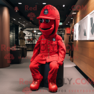 Maskot karakter af en rød...