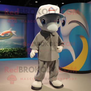 Gray Dolphin mascot costume character dressed with a Shorts and Caps