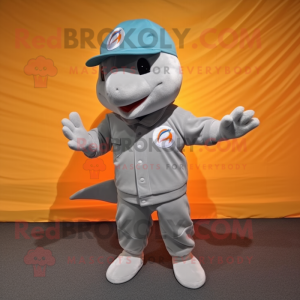 Gray Dolphin mascot costume character dressed with a Shorts and Caps