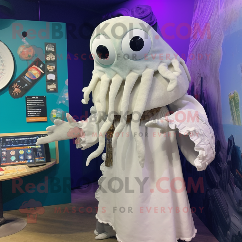 White Kraken mascot costume character dressed with a Blouse and Shawl pins White Kraken mascot costume character dressed with a Blouse and Shawl pins