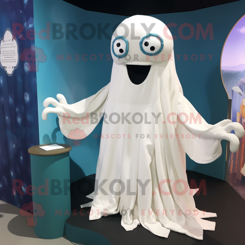 White Kraken mascot costume character dressed with a Blouse and Shawl pins White Kraken mascot costume character dressed with a Blouse and Shawl pins
