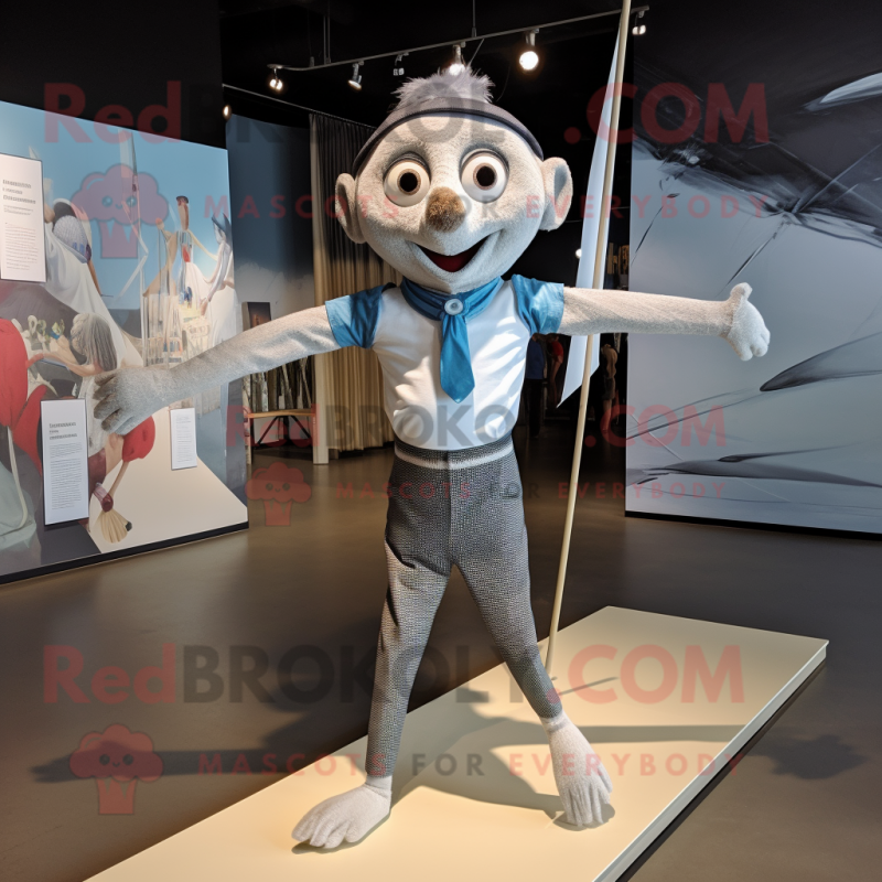 Silver Tightrope Walker mascot costume character dressed with a Graphic Tee and Pocket squares
