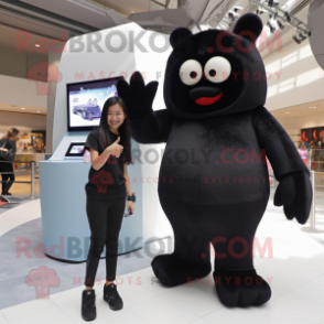 Black Ice mascot costume character dressed with a Jeggings and Watches