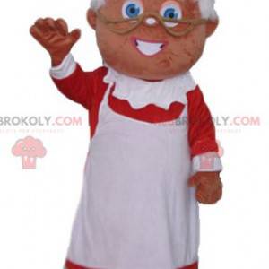 La mascotte della signora Claus vestito con un abito rosso e