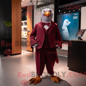 Maskotfigur af en rødbrun...