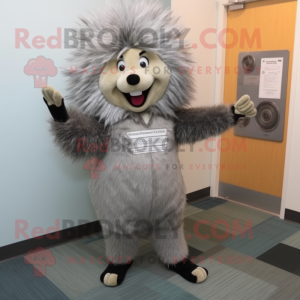 Gray Porcupine mascot costume character dressed with a Dress Pants and Gloves