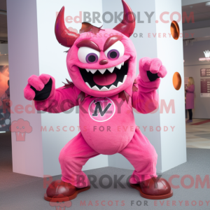 Maskotkarakter av en rosa...