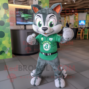 Green Bobcat mascot costume character dressed with a Graphic Tee and Smartwatches