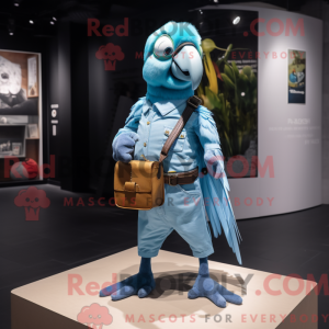 Maskotkarakter af en cyan...