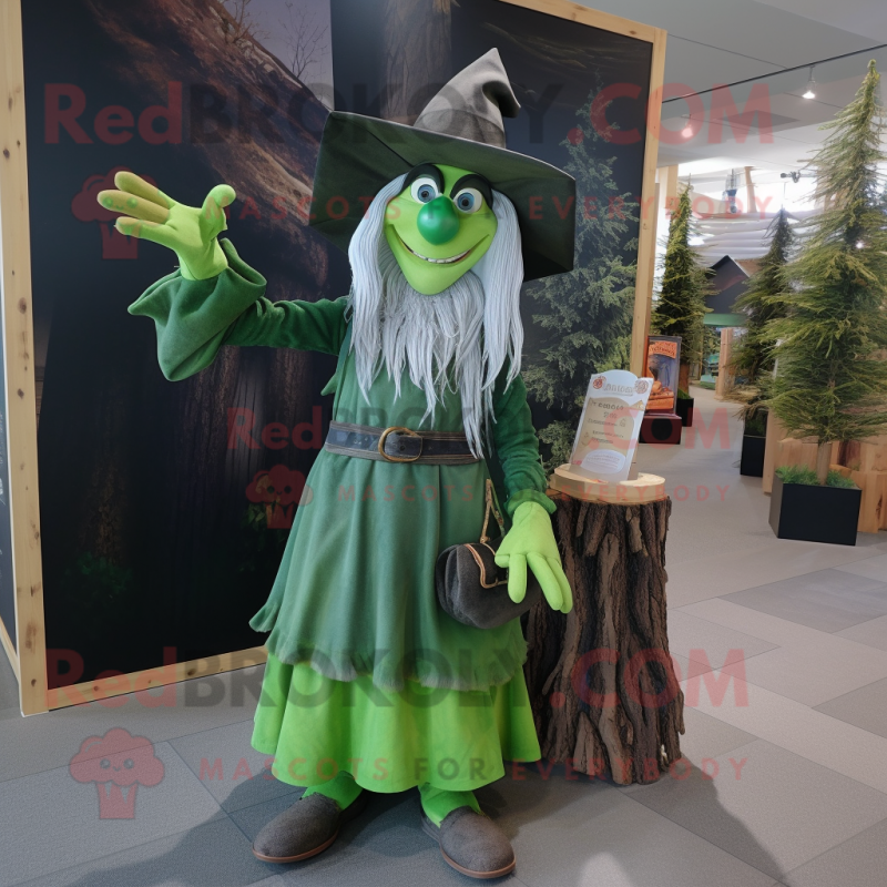 Forest Green Witch mascot costume character dressed with a Chambray Shirt and Cummerbunds Forest Green Witch mascot costume character dressed with a Chambray Shirt and Cummerbunds