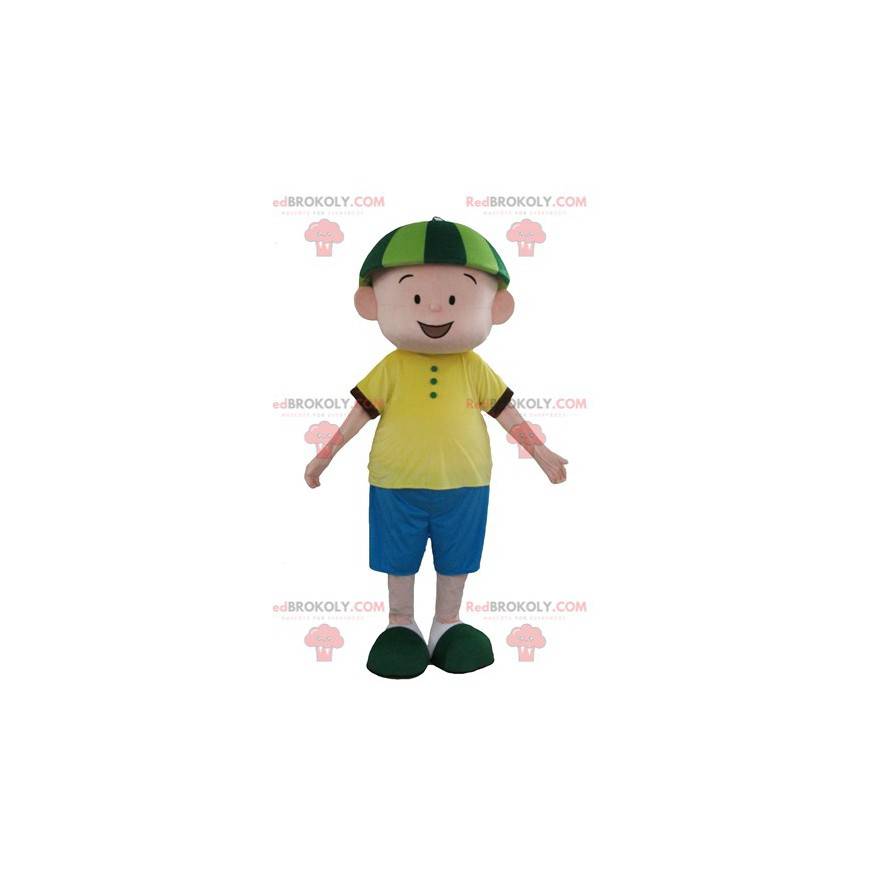Mascotte de garçon en tenue bleue et jaune avec un chapeau vert