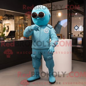 Maskotfigur av en cyan...