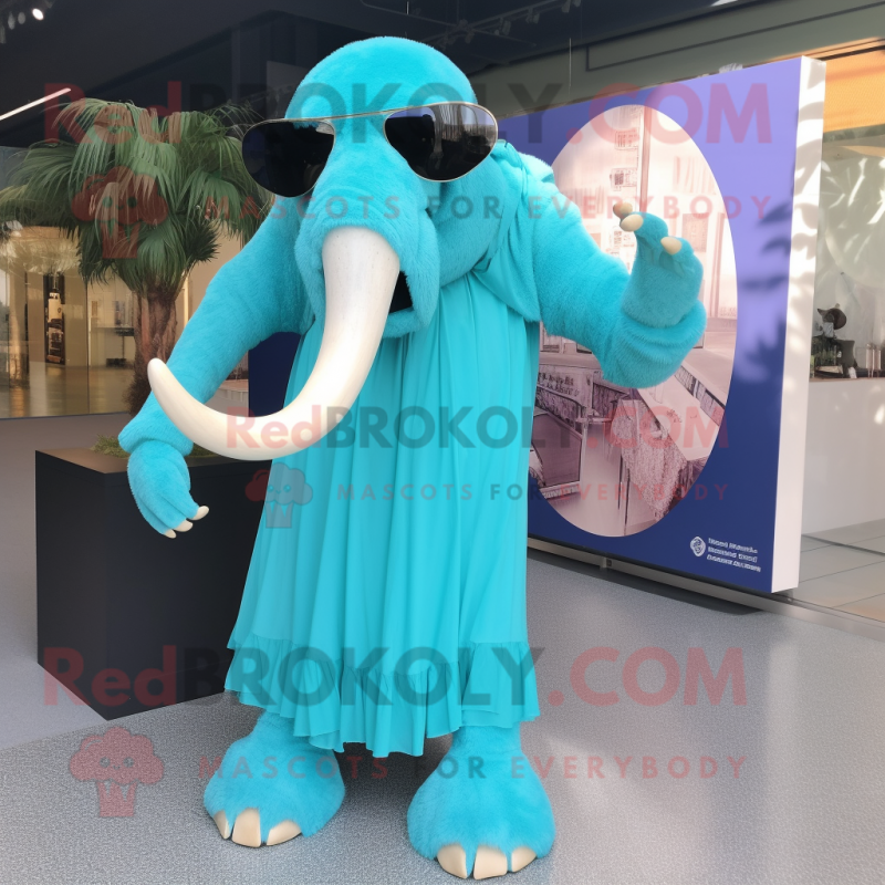 Cyan Mammoth mascot costume character dressed with a Empire Waist Dress and Sunglasses