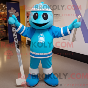 Maskotfigur av en cyan...