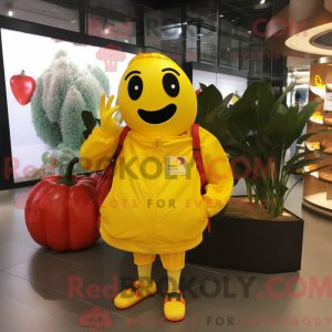 Maskotkarakter af en gul...