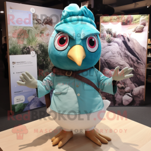 Turquoise Quail mascot costume character dressed with a Poplin Shirt and Headbands