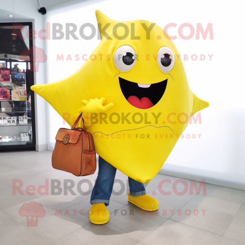 Yellow Stingray mascot costume character dressed with a Jeans and Messenger bags Yellow Stingray mascot costume character dressed with a Jeans and Messenger bags