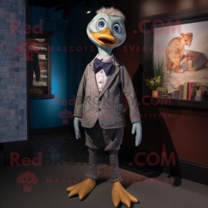 nan Gosling mascot costume character dressed with a Skinny Jeans and Pocket squares