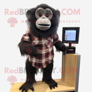 Black Capuchin Monkey mascot costume character dressed with a Flannel Shirt and Digital watches