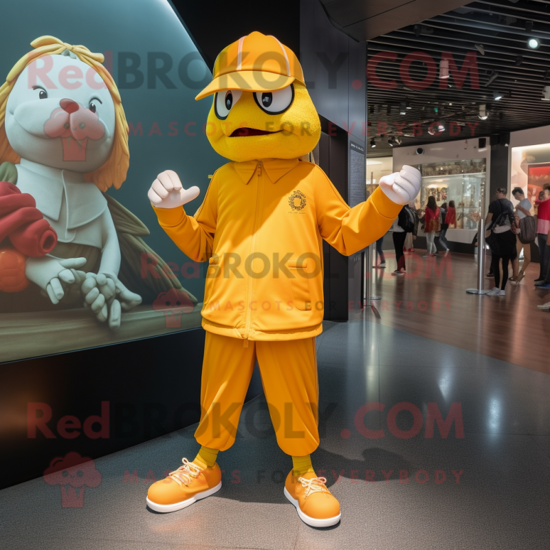 Gold Mandarin mascot costume character dressed with a Joggers and Berets