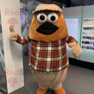 Tan Shakshuka mascot costume character dressed with a Flannel Shirt and Wraps