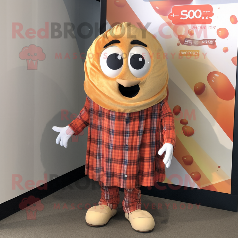 Tan Shakshuka mascot costume character dressed with a Flannel Shirt and Wraps Tan Shakshuka mascot costume character dressed with a Flannel Shirt and Wraps