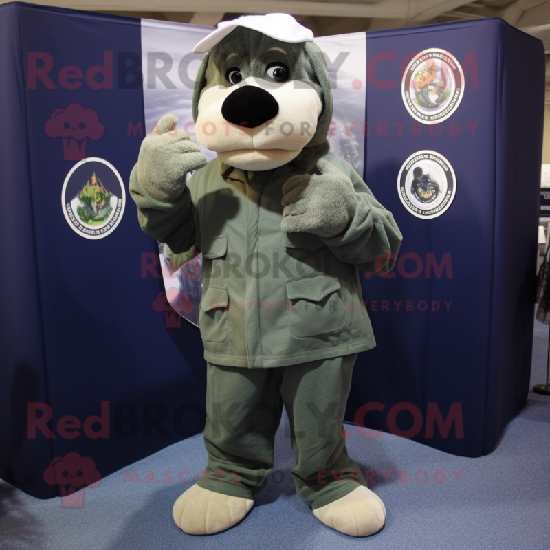 Olive Navy Seal mascot costume character dressed with a Henley Shirt and Shawl pins