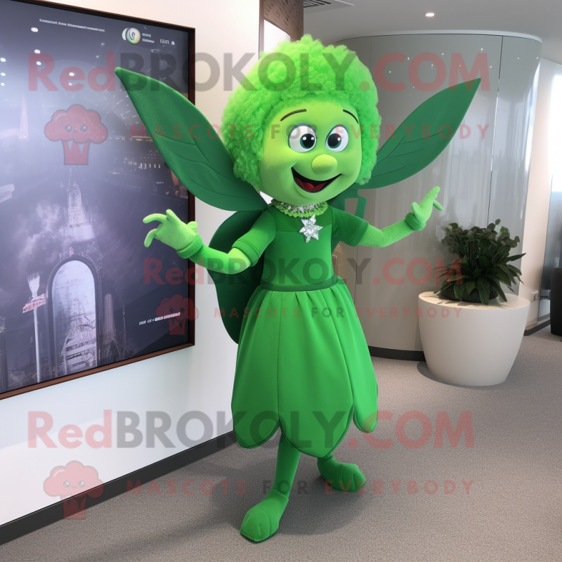 Green Tooth Fairy mascot costume character dressed with a Sheath Dress and Hair clips Green Tooth Fairy mascot costume character dressed with a Sheath Dress and Hair clips