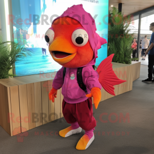 Magenta Goldfish mascot costume character dressed with a Corduroy Pants and Bracelets