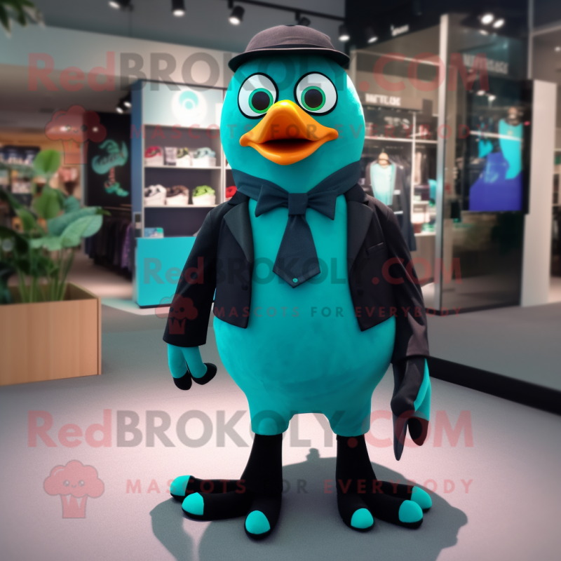Teal Blackbird mascot costume character dressed with a Suit and Anklets Teal Blackbird mascot costume character dressed with a Suit and Anklets