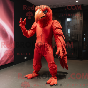 Mascottefiguur van een rode...