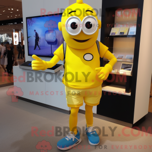 Maskotfigur af en citrongul...