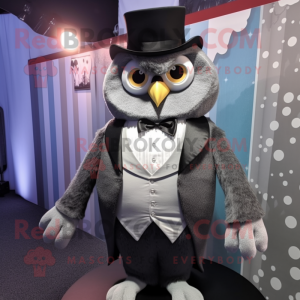 Gray Owl mascot costume character dressed with a Tuxedo and Cummerbunds