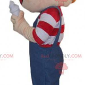 Mascot red-haired boy in overalls with an ice cream -