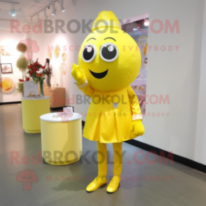 Lemon Yellow Engagement Ring mascot costume character dressed with a Trousers and Hair clips
