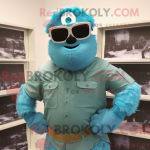 Maskotfigur av en turkis...