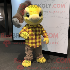 Maskotkarakter af en gul...