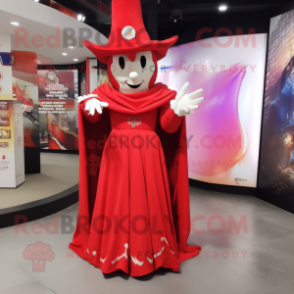 Red Magician mascot costume character dressed with a Empire Waist Dress and Rings