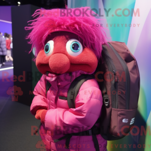 Maskotfigur af en magenta...