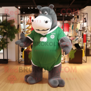 Forest Green Hippopotamus mascot costume character dressed with a Rugby Shirt and Shoe clips