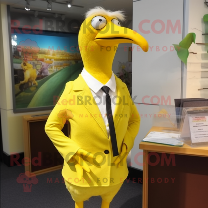 Lemon Yellow Albatross mascot costume character dressed with a Pencil Skirt and Tie pins