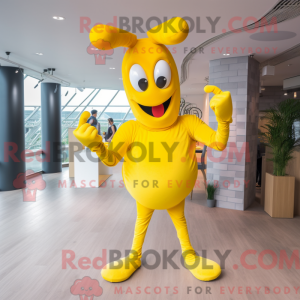 Maskotkarakter af en gul...