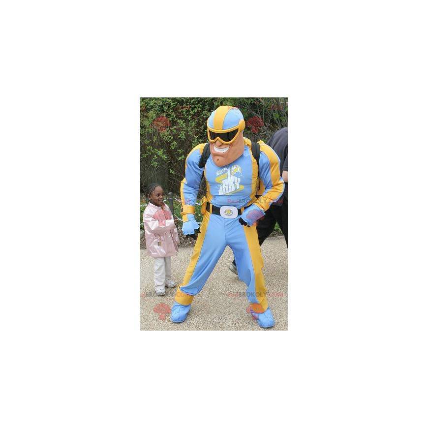 Mascote do super-herói em traje azul e amarelo - Redbrokoly.com