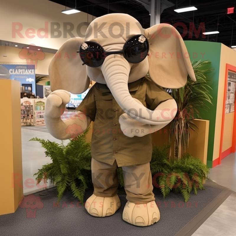 Tan Elephant mascot costume character dressed with a Tank Top and Sunglasses